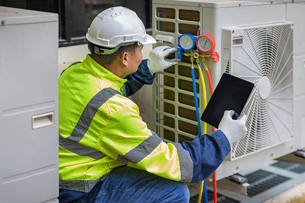 Professional Ductwork Repair technician working in Munith, MI